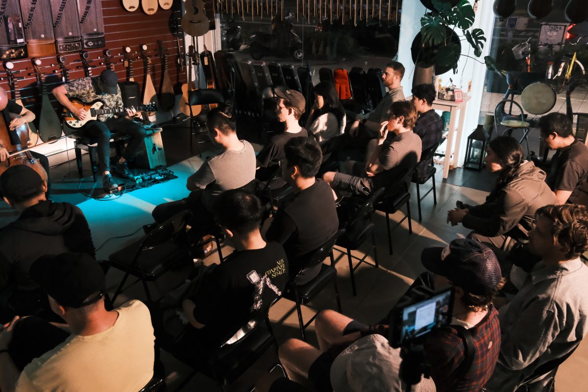 Performance and event space set with seating and traditional instruments